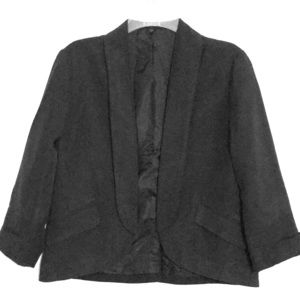 Black cropped blazer.